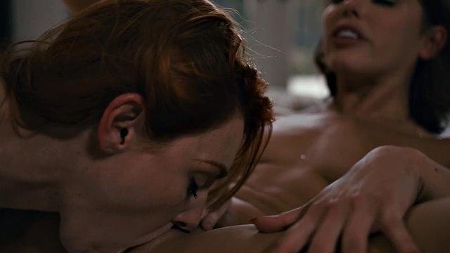 Watch how this ginger babe gets down and dirty with her girlfriend while getting her pussy licked and fingered in the living room