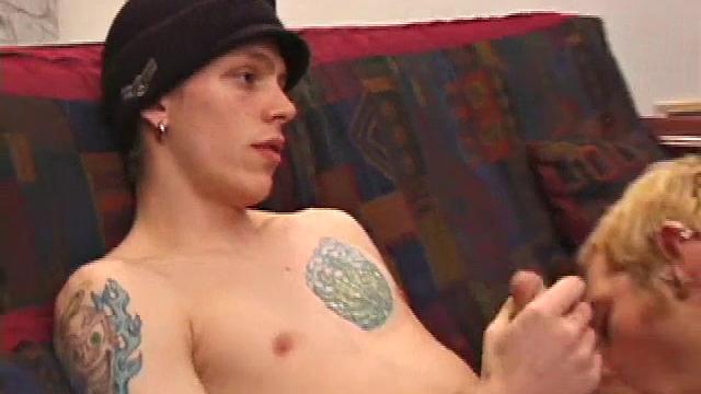 Torque and Shane are watching a movie and rubbing their bulges. Torque reaches over to feel Shane's package, before they strip off their shirts and tug down pants.