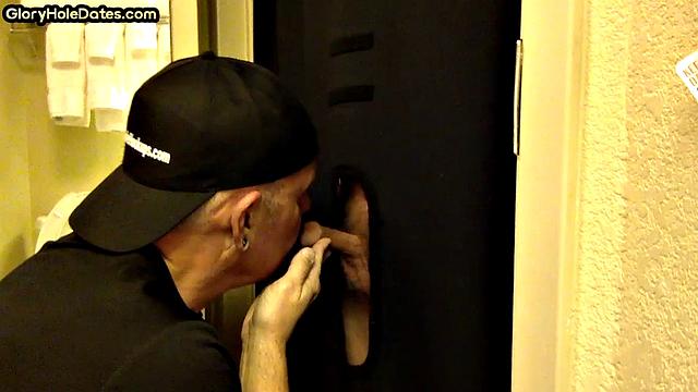 Gloryhole DILF sucks cock with eager mouth near toilet