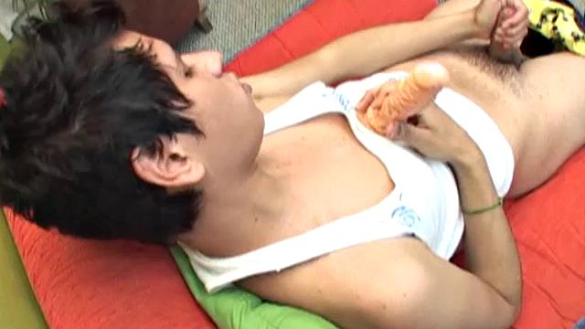 We look in on Latin cutie Samuel seated with a hard cock in one hand and a dildo in the other. After getting completely naked it's obvious this boy isn't going to get anything done without some anal stimulation.