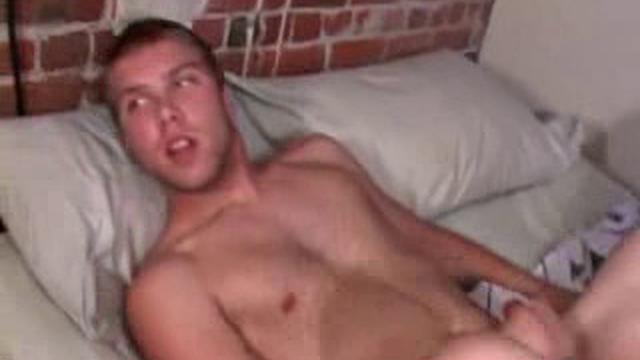 Caleb Lewis is already at work on his cock, as he pulls off his pants. He fingers his butt as he strokes, and in no time he pumps out a wad which he quickly eats up.