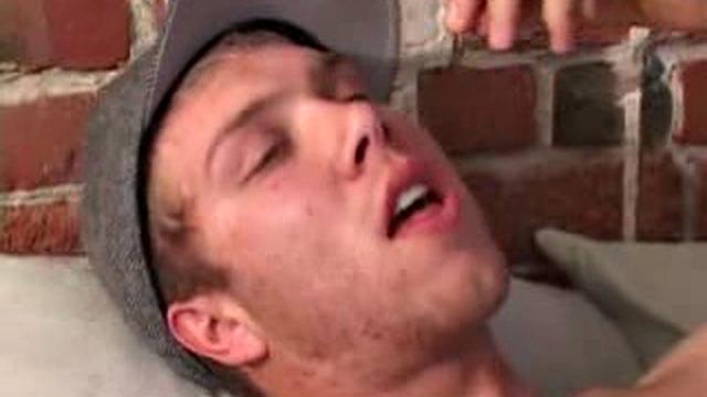 Caleb Lewis is already at work on his cock, as he pulls off his pants. He fingers his butt as he strokes, and in no time he pumps out a wad which he quickly eats up.