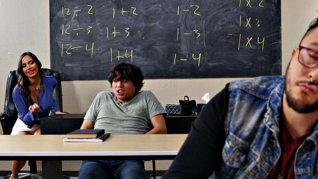 Busty teacher rides short student during class