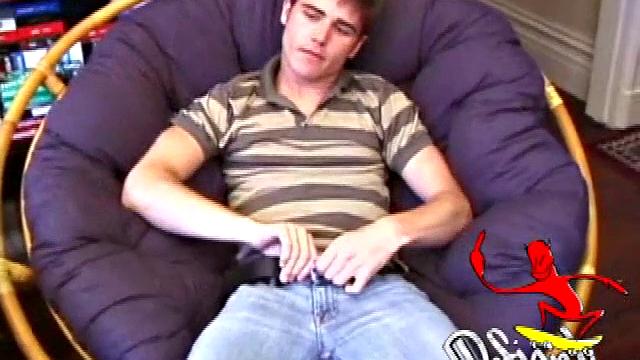 Austin pulls down his jeans, while watching a porn video, and gets his dick hard