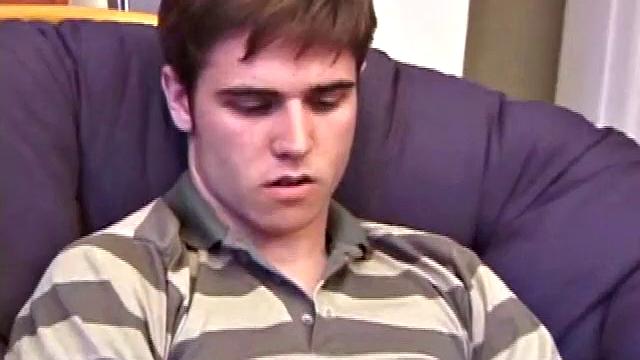 Austin pulls down his jeans, while watching a porn video, and gets his dick hard