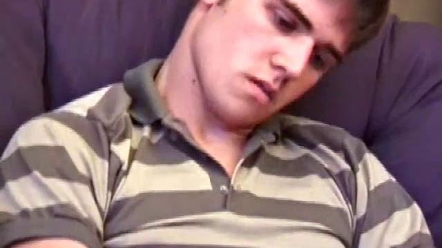 Austin pulls down his jeans, while watching a porn video, and gets his dick hard