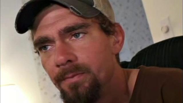 This rugged little street guy, with blue eyes, is 28 years old. He makes his living in the refrigeration business.