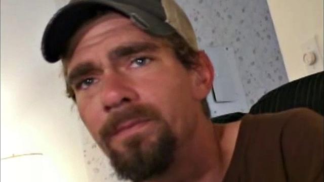 This rugged little street guy, with blue eyes, is 28 years old. He makes his living in the refrigeration business.