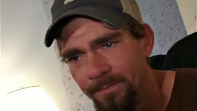 This rugged little street guy, with blue eyes, is 28 years old. He makes his living in the refrigeration business.