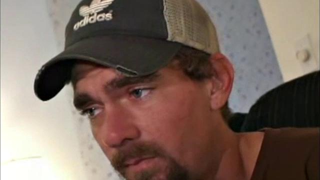 This rugged little street guy, with blue eyes, is 28 years old. He makes his living in the refrigeration business.