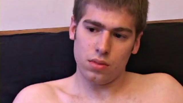 Adam Turner strips naked and grabs the lube, as he checks out a video that's playing. He works himself stiff and strokes with determination, until his cum starts pumping.