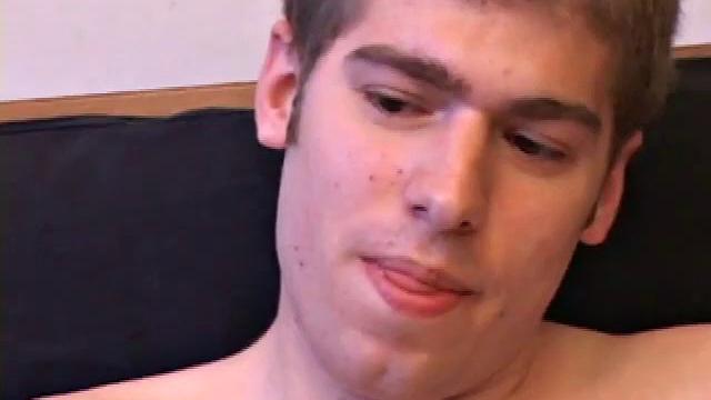 Adam Turner strips naked and grabs the lube, as he checks out a video that's playing. He works himself stiff and strokes with determination, until his cum starts pumping.