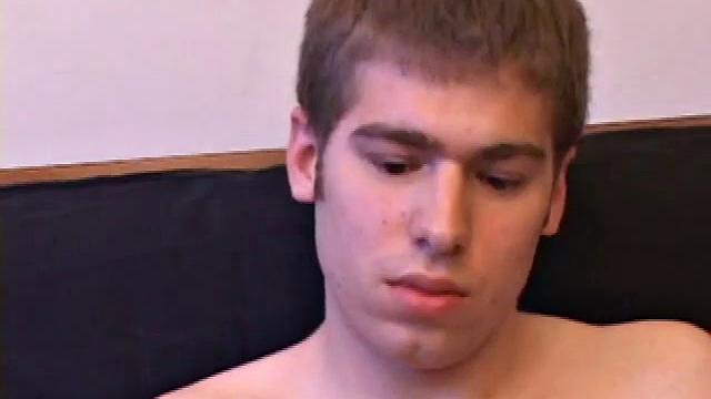 Adam Turner strips naked and grabs the lube, as he checks out a video that's playing. He works himself stiff and strokes with determination, until his cum starts pumping.