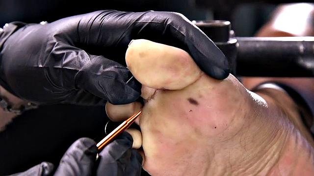 Feet tormented Ebony sub gets whipped by her master