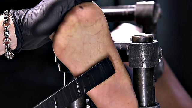 Feet tormented Ebony sub gets whipped by her master