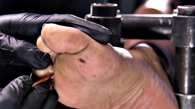 Feet tormented Ebony sub gets whipped by her master