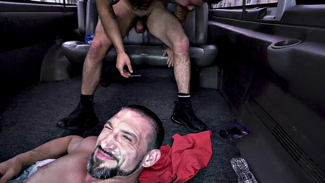 Tattooed stud barebacks and fucks hard in van, then takes a messy facial