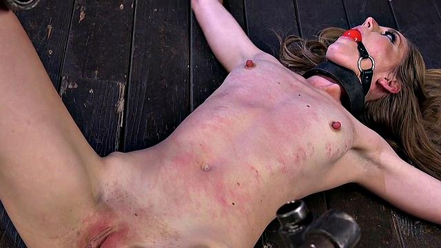 Tormented BDSM sub ballgagged mouth gets whipped