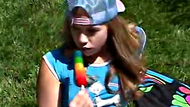 Teen rubbing her clit outdoors