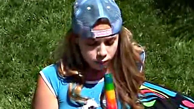 Teen rubbing her clit outdoors