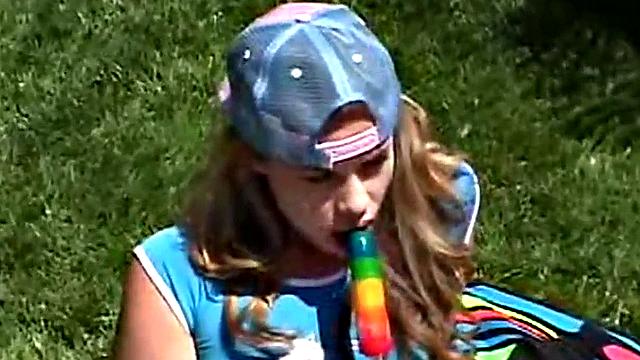 Teen rubbing her clit outdoors