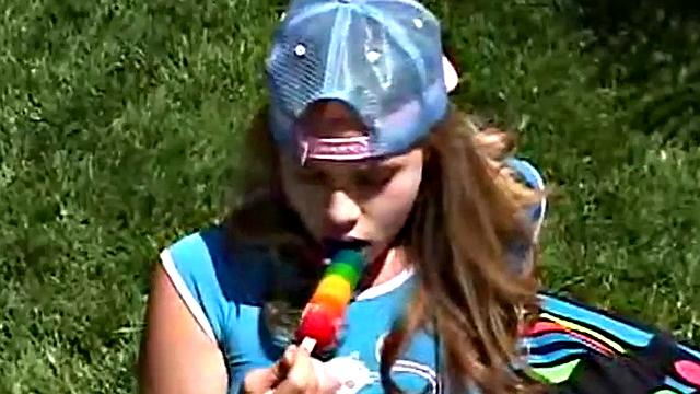 Teen rubbing her clit outdoors