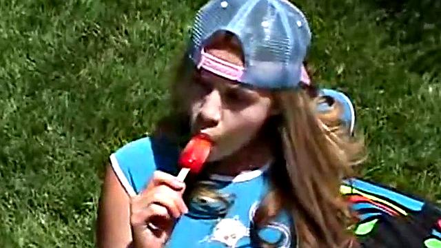 Teen rubbing her clit outdoors