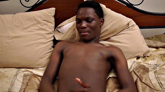 Skinny Nubian stroking his oiled shaft in solo