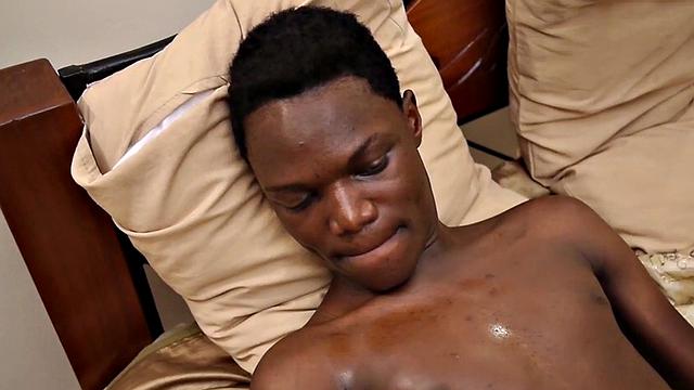 Skinny Nubian stroking his oiled shaft in solo