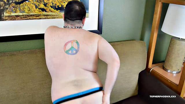 Dean Gauge, 2018 Ravens Eden Awards Best Newcomer, is back for another shoot with Topher Phoenix. Enjoy, as Dean strips naked, works his thick cock, and fingers his hole.