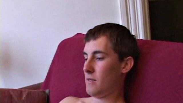 Amateur Kiefer Foxx strips off and strokes to porn video, pumping cum on his chest