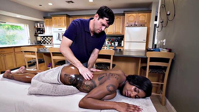 Watch this tattooed ebony with a big ass get pounded by a big white dick in her trimmed pussy