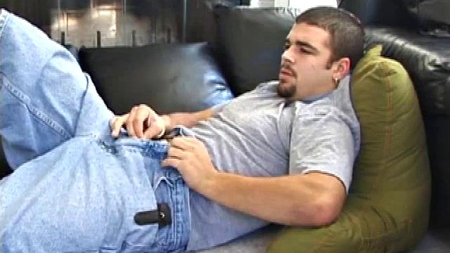 Young Tony watches a porn video and strokes his dick until launching a massive load