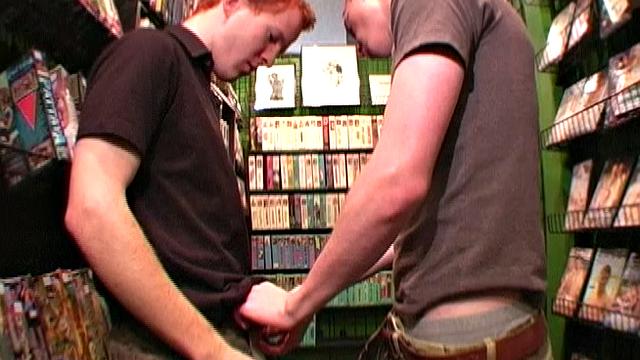 We look in on Trae and Blu as they are browsing the displays at a local adult bookstore before ducking back into the XXX room for some 1-on-1 action with each other. The boys trade blowjobs, swallowing each other's huge 8+ inch dicks.