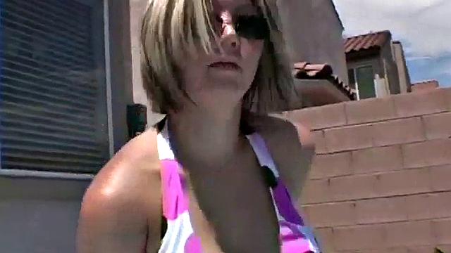 Teasing blonde shows off her bikini body