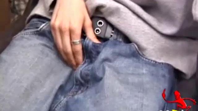 As a porno plays, Aaron strokes himself and pulls his cock out of his jeans. After a nice long stroke show, this man spills his warm sticky cum onto the bed.