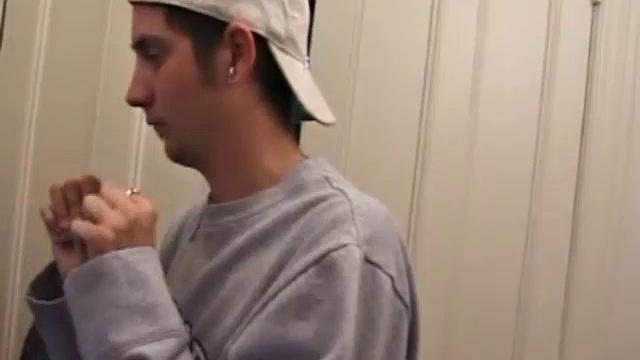 As a porno plays, Aaron strokes himself and pulls his cock out of his jeans. After a nice long stroke show, this man spills his warm sticky cum onto the bed.