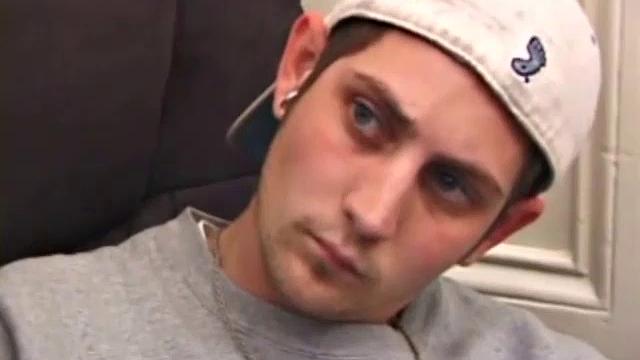 As a porno plays, Aaron strokes himself and pulls his cock out of his jeans. After a nice long stroke show, this man spills his warm sticky cum onto the bed.