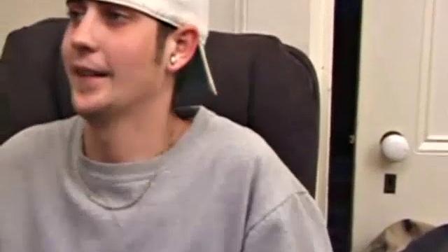 As a porno plays, Aaron strokes himself and pulls his cock out of his jeans. After a nice long stroke show, this man spills his warm sticky cum onto the bed.