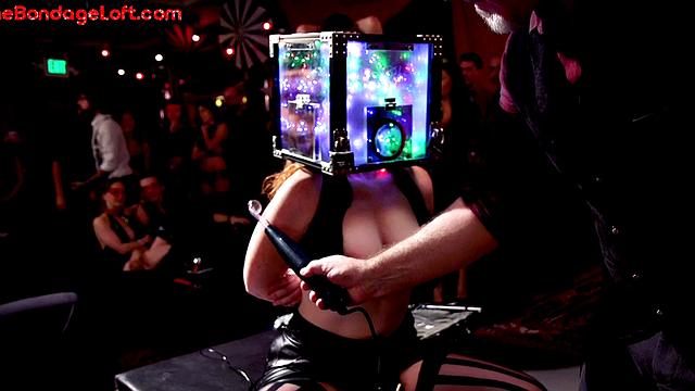 Public BDSM sub with head box punished with whipping