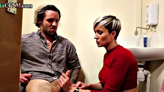 CFNM British MILF with tattoos gives HJ to lucky man