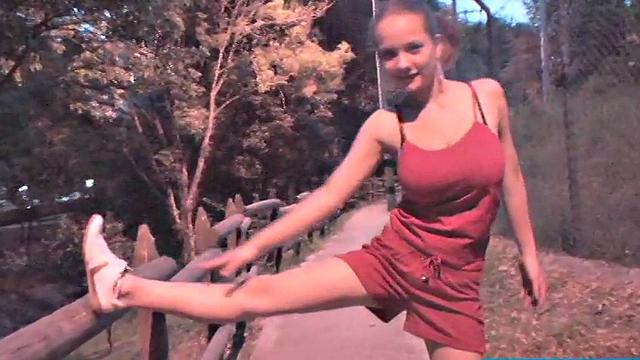 Busty teen jiggles her tits in public