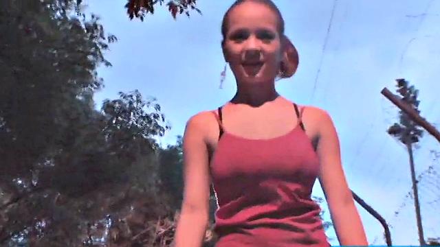 Busty teen jiggles her tits in public