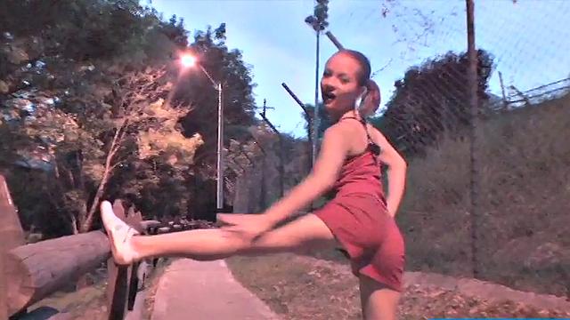 Busty teen jiggles her tits in public