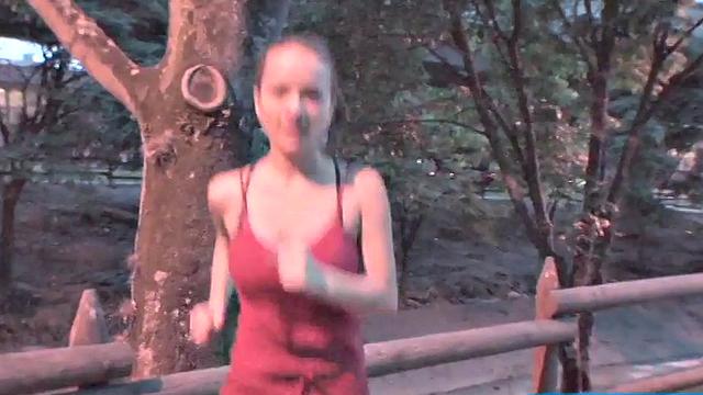Busty teen jiggles her tits in public