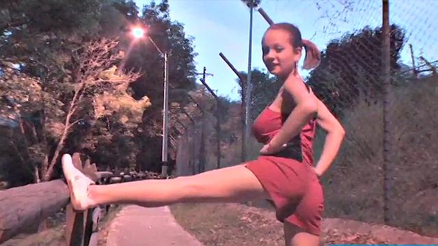 Busty teen jiggles her tits in public