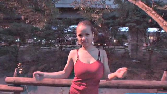 Busty teen jiggles her tits in public