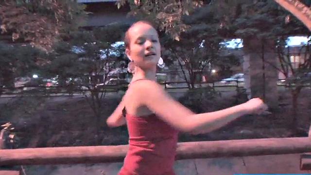 Busty teen jiggles her tits in public