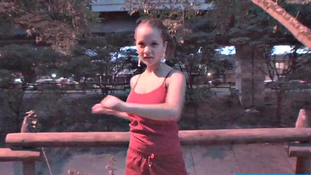 Busty teen jiggles her tits in public