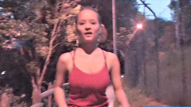 Busty teen jiggles her tits in public